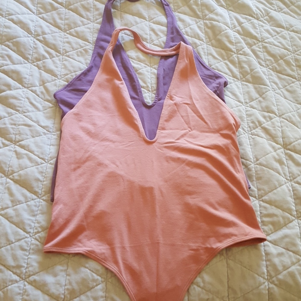 LOT of two express bodysuits. Size M. New.